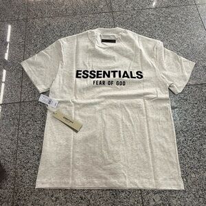 Fear of God ESSENTIALS Cream Logo Short Sleeve Tee